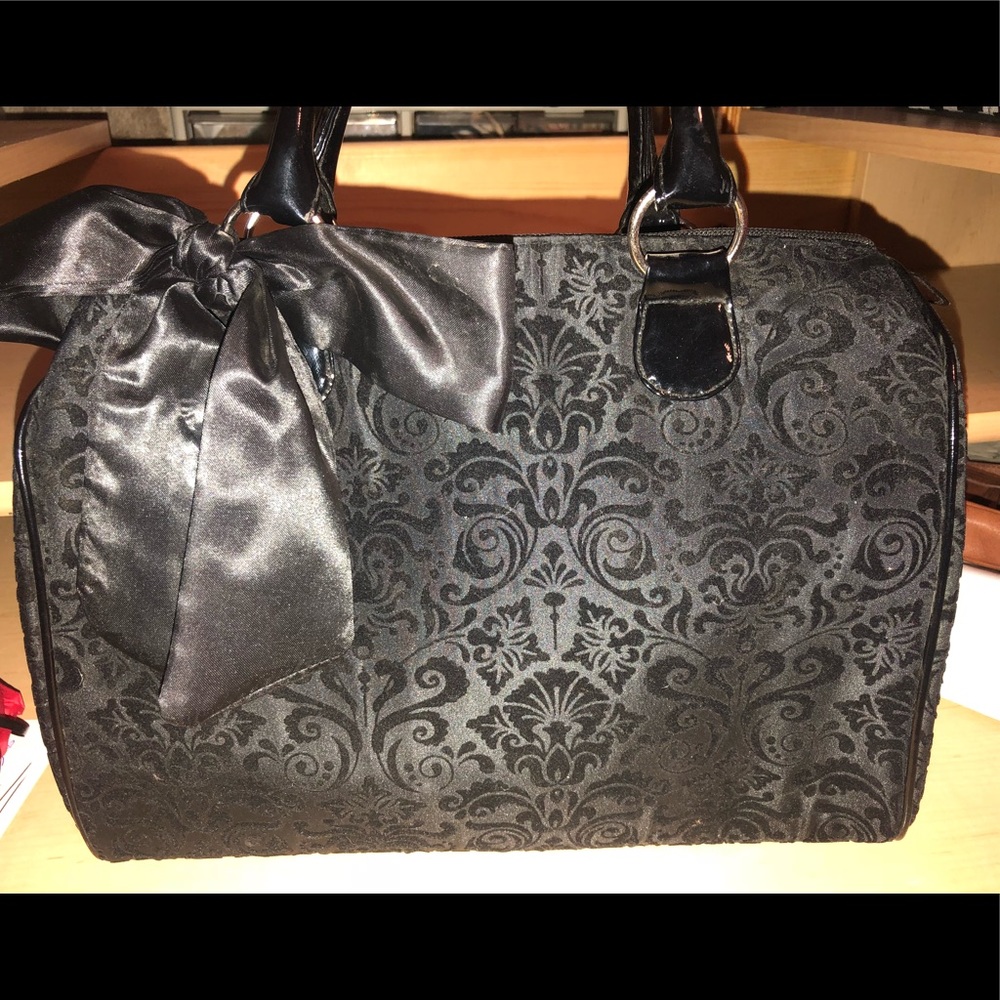 Black patterned bow purse